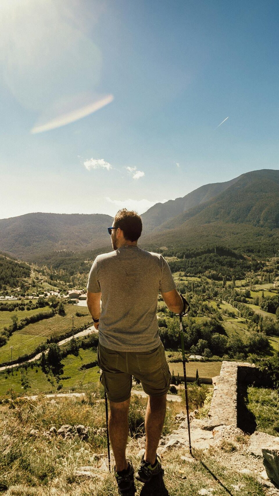 Man Walking on Mountain Trail